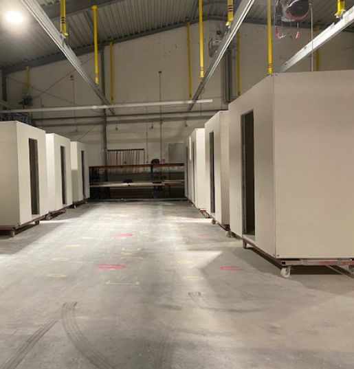 Prefabricated bathroom modules in the production hall