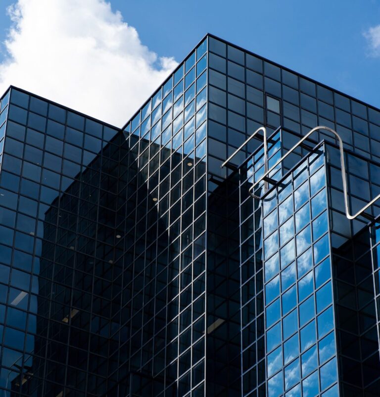 Facade of a high-rise building in steel and glass, illustrative image
